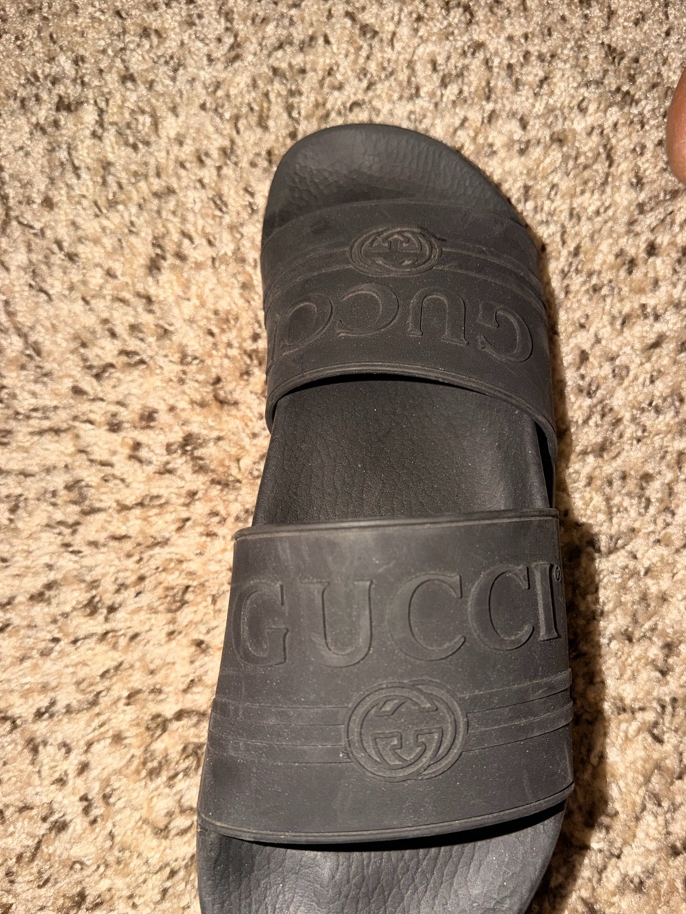 Gucci women Black Embossed Logo Slide Sandals